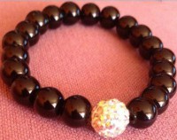 pulsera bolas de onix y bola rhinstone blanca